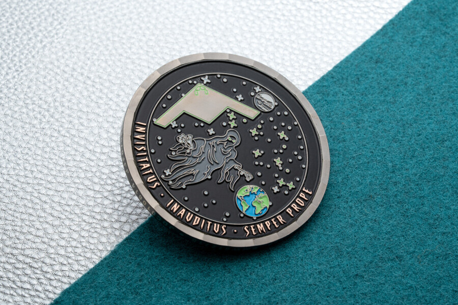 Challenge coin with a flat weave bevel edge