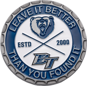 Challenge coin with a spur edge