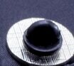 Rubber clutch backing on the back of a pin