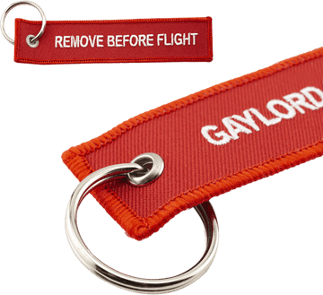 Embroidered patch with a keyring attachment