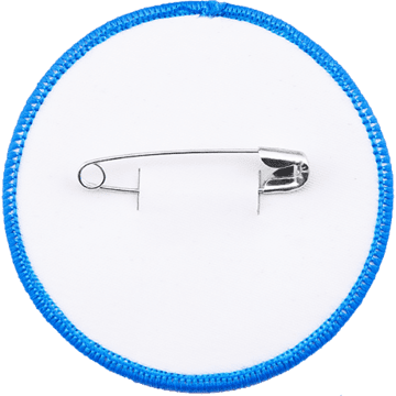 Safety pin backing on an embroidered patch